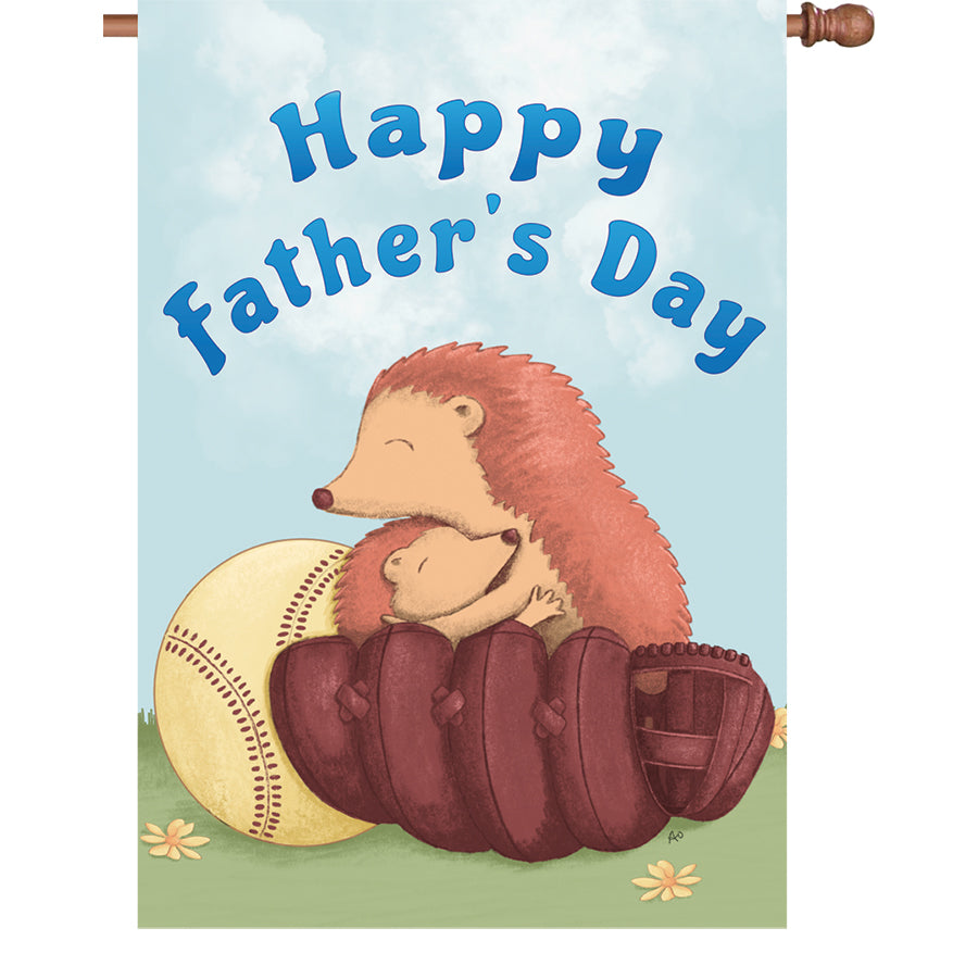 28 inch Hedgehugs flag featuring a smiling hedgehog and 'Happy Father's Day' message, displayed on a flagpole in a sunny garden setting.