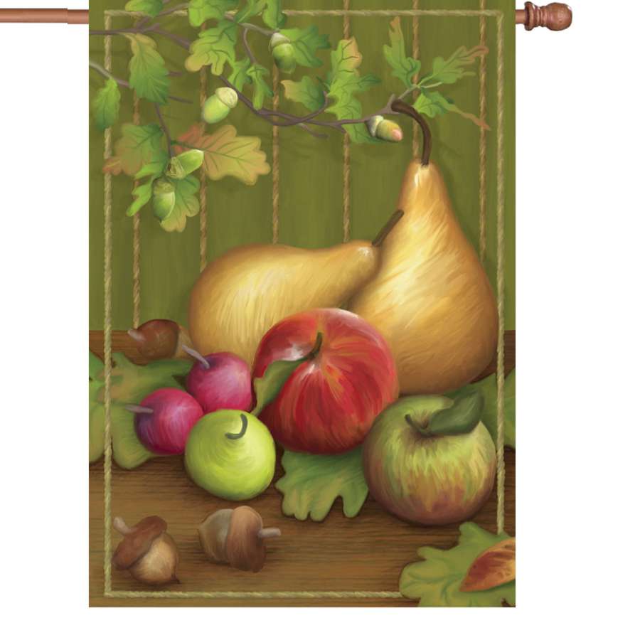 28 in. illuminated outdoor flag featuring a vibrant pears design showcased prominently in a front yard during autumn.