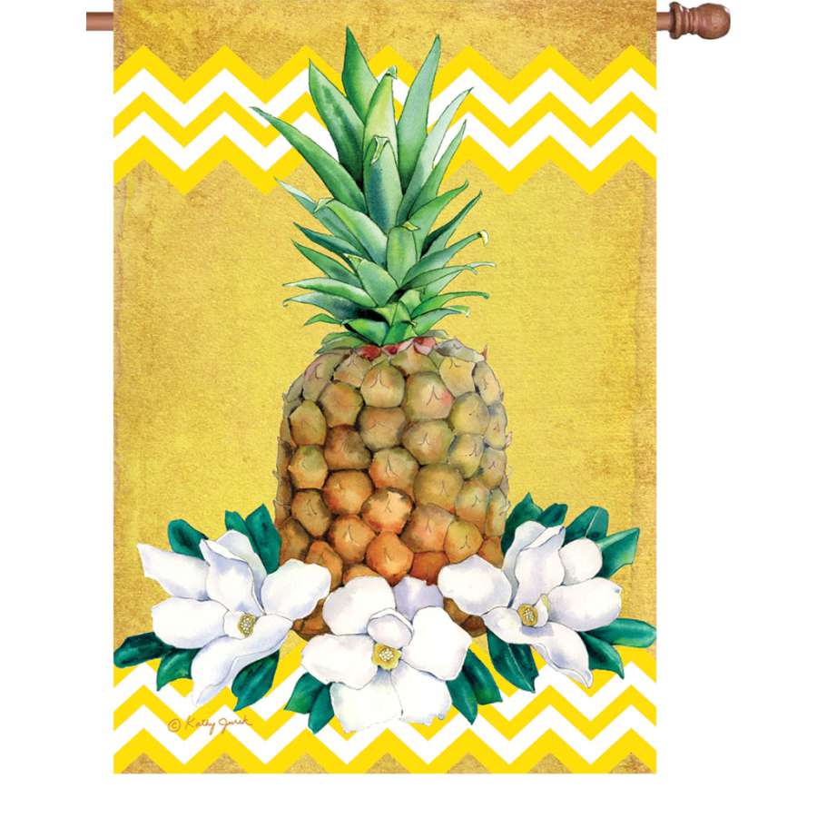 28 in. Pineapple Flag made from durable polyester, featuring a bright tropical design, displayed on an outdoor flag pole against a blue sky.