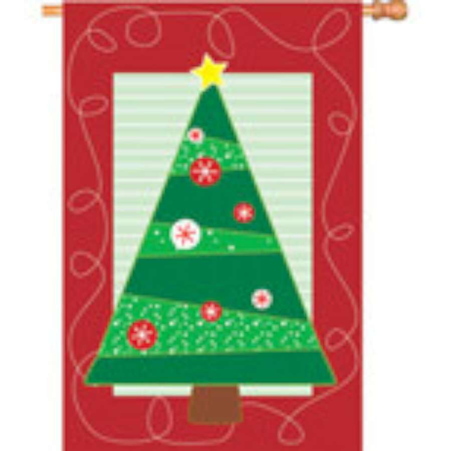 28 in. Soho Christmas house flag displaying festive designs with snowflakes and Christmas trees, brightening up a winter porch setting.