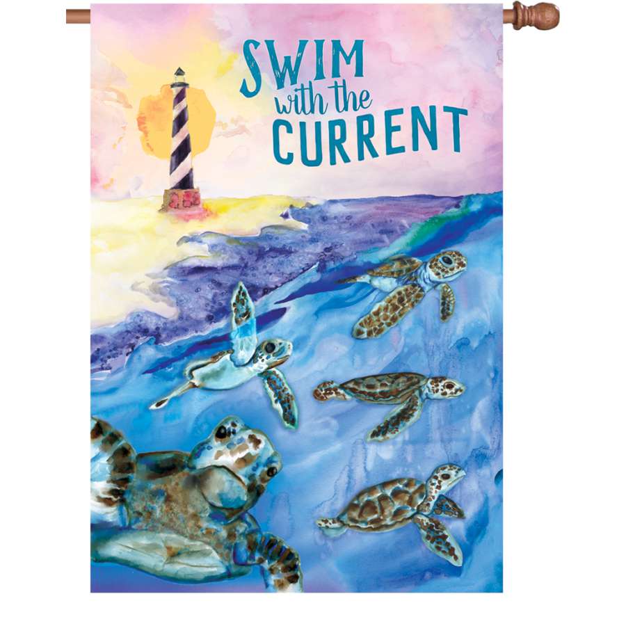 28 in. Swim With The Current flag featuring a vibrant design and uplifting text displayed outdoors in a garden setting.