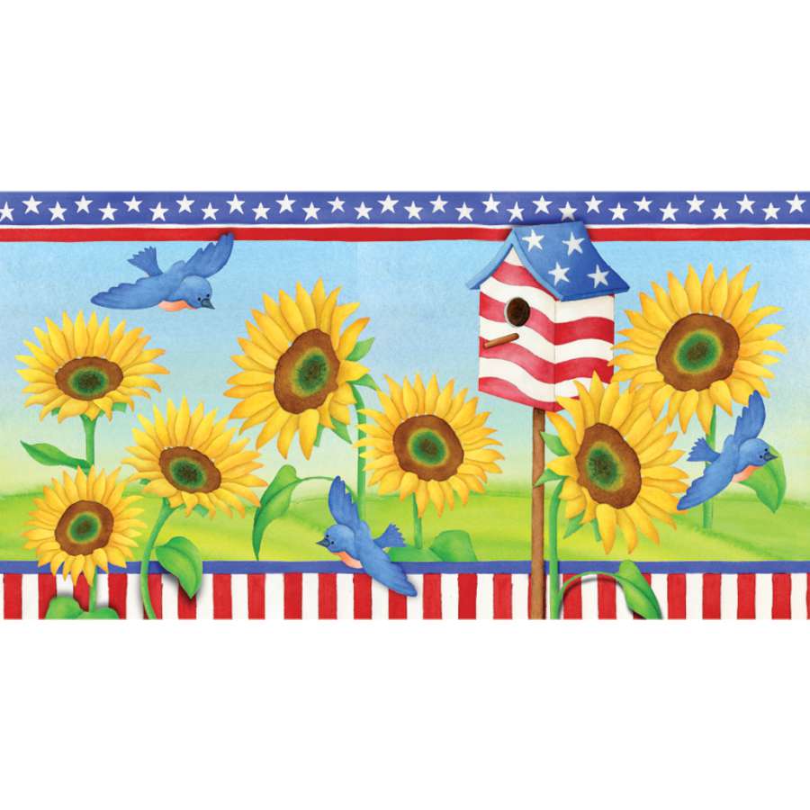 28 in. Windsock featuring bright and colorful patriotic sunflowers, beautifully fluttering in the breeze, displayed outdoors in a garden setting.
