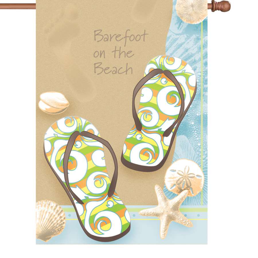 28-inch Barefoot On Beach house flag featuring colorful footprints in sand against a beach background, displayed in a sunny outdoor setting.