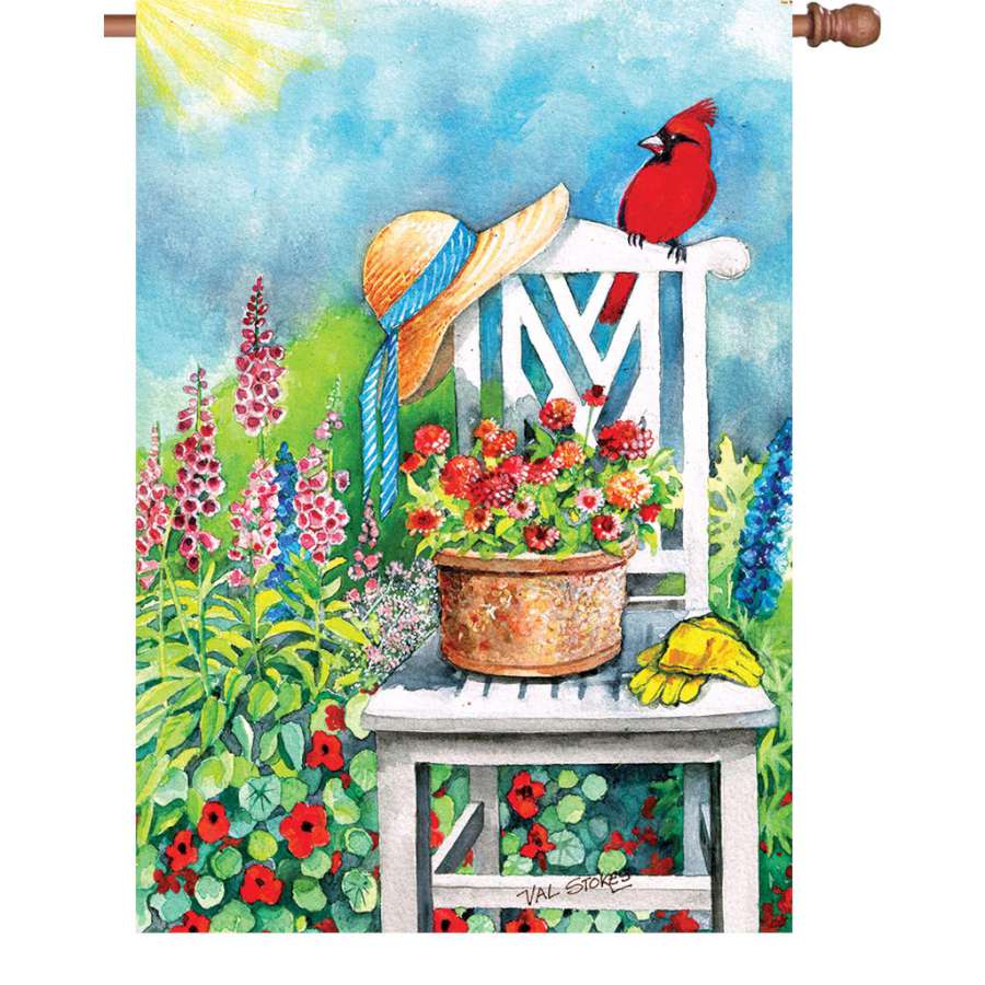 28-inch Gardener's Patch illuminated flag featuring bright colors and intricate designs, displayed in a vibrant garden setting.