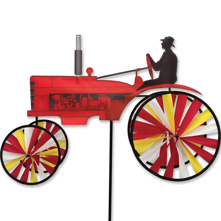 29 in. Old Tractor Spinner - Red, featuring a vintage tractor design, spinning in a garden setting to enhance decor with nostalgic charm.