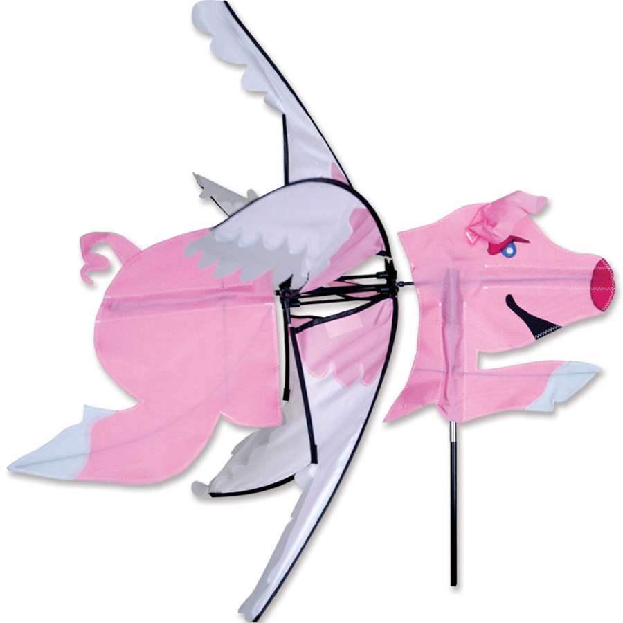 Colorful 30 in. Flying Pig Spinner in a garden setting, showcasing a whimsical design with spinning wings and a joyful look.