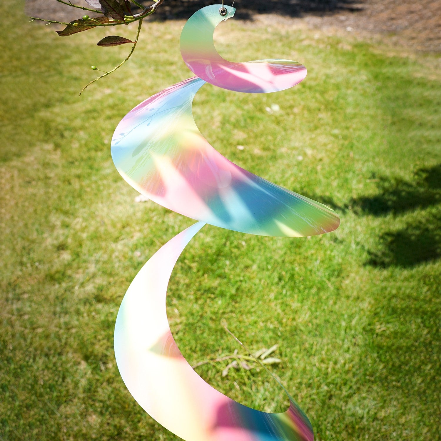 30" Striped Iridescent Twister Tail with vibrant colors and rotational design, gracefully spinning in the breeze and enhancing outdoor aesthetics.