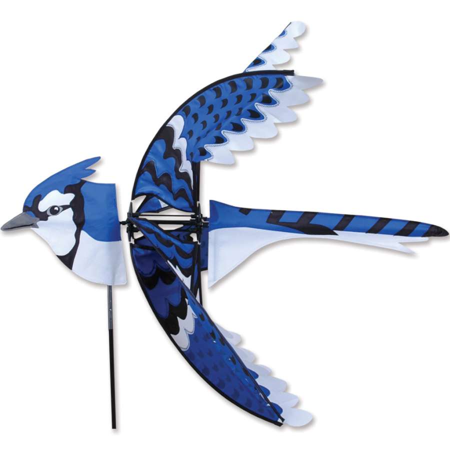 35 inch Flying Eastern Blue Jay Spinner with vibrant blue and white colors, gracefully spinning in an outdoor garden setting.