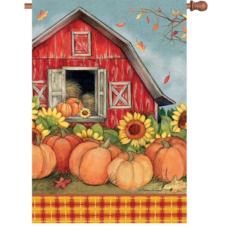 36 in. Elite Oversized House Flag featuring a charming pumpkin barn design, displayed on a flagpole in a vibrant autumn outdoor setting.