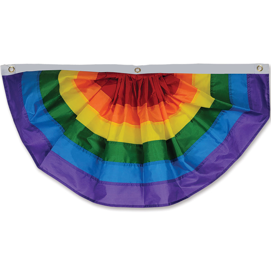 36 in. Rainbow Bunting hanging outside, showcasing vibrant colors in a festive outdoor setting during a celebration.