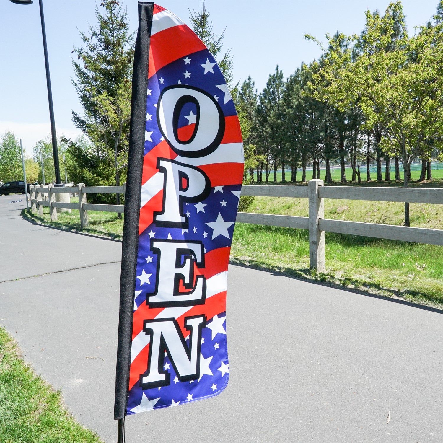 4' Heavy Duty Open Stars & Stripes Double Sided Feather Banner showcasing vibrant colors, designed for outdoor display and visibility for businesses.