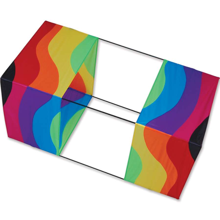 40 in. Box Kite - Wavy Rainbow with a vibrant design flying against a clear blue sky, showcasing its colorful and durable features.