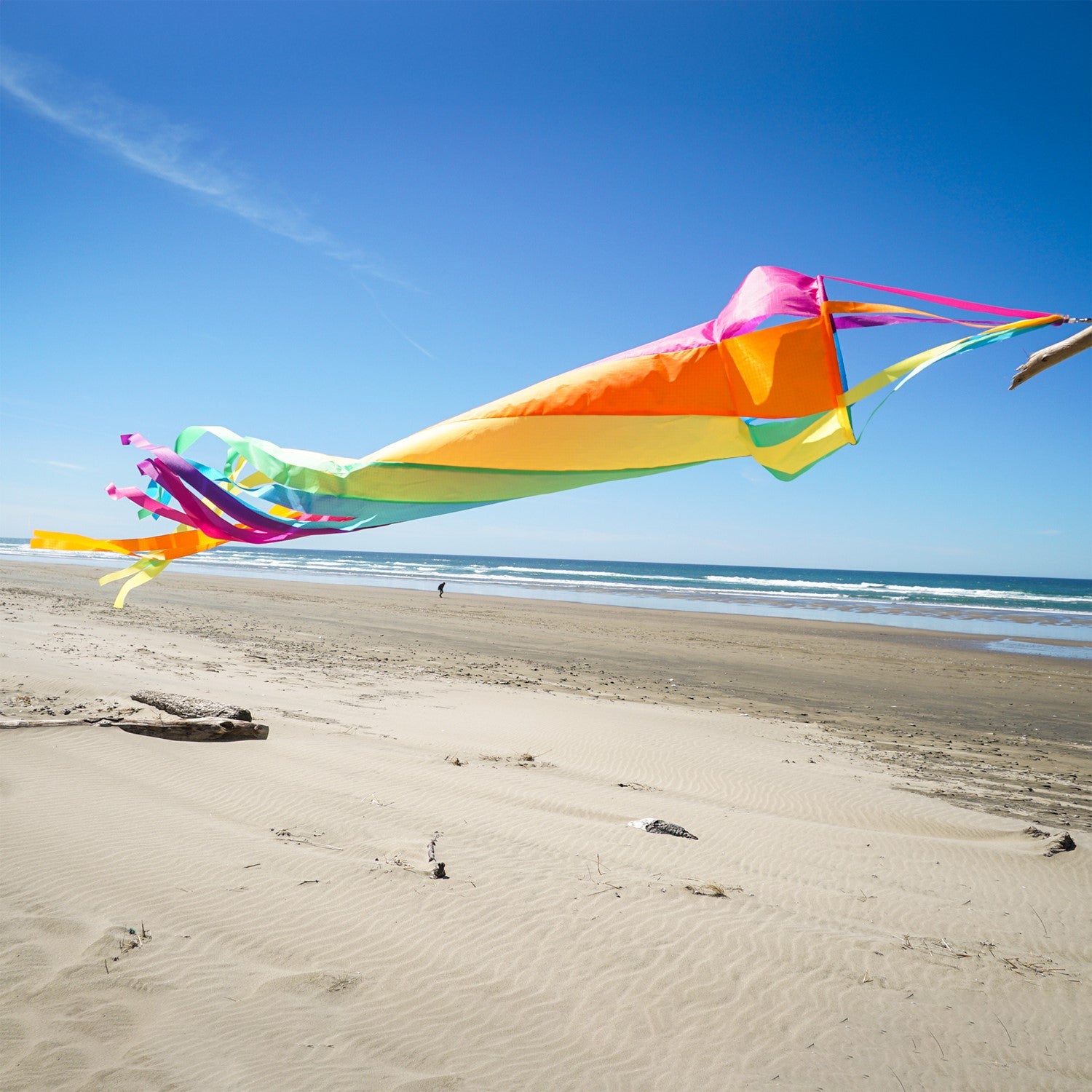 60" Fiesta Spinsock in vibrant colors, spinning elegantly in the breeze, designed to enhance outdoor decor.