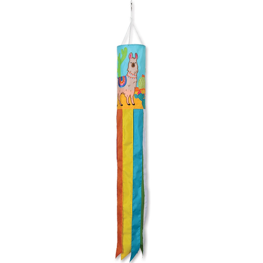 60 in. Embroidered Applique Windsock displaying a colorful alpaca design fluttering against a clear blue sky in a garden setting.