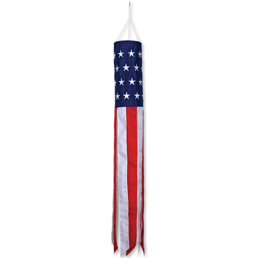 60 in. Windsock displaying Patriotic Embroidered Stars with red and white streamers, fluttering in the wind against a clear blue sky.