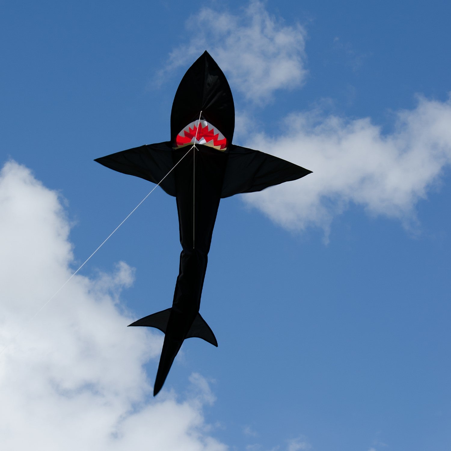7.5' 3D Shark Kite, large and vibrant black shark design, flying in the sky with realistic 3D features, perfect for family fun outdoors.