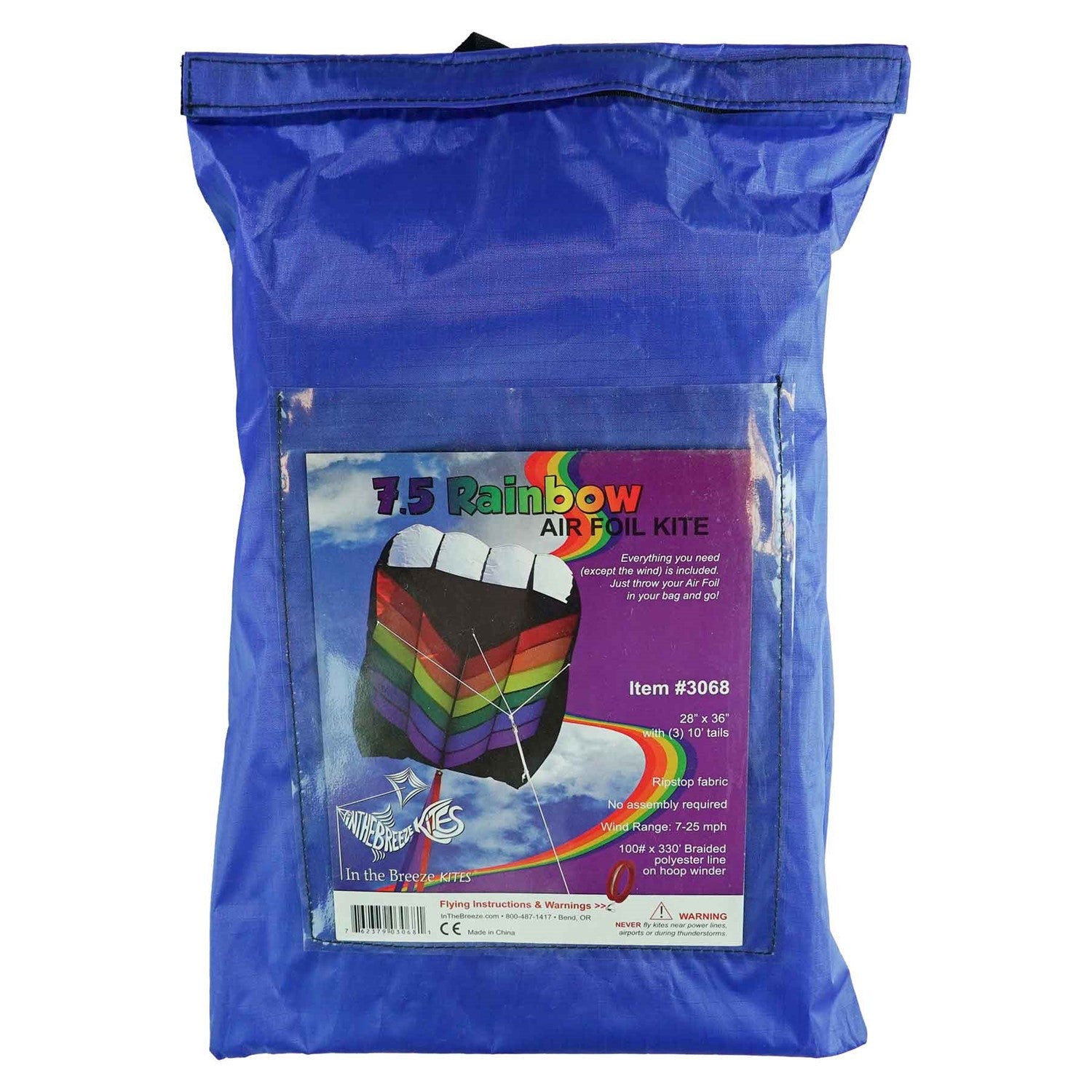 7.5 Rainbow Air Foil kite in flight, showcasing vibrant colors and aerodynamic design against a clear blue sky.