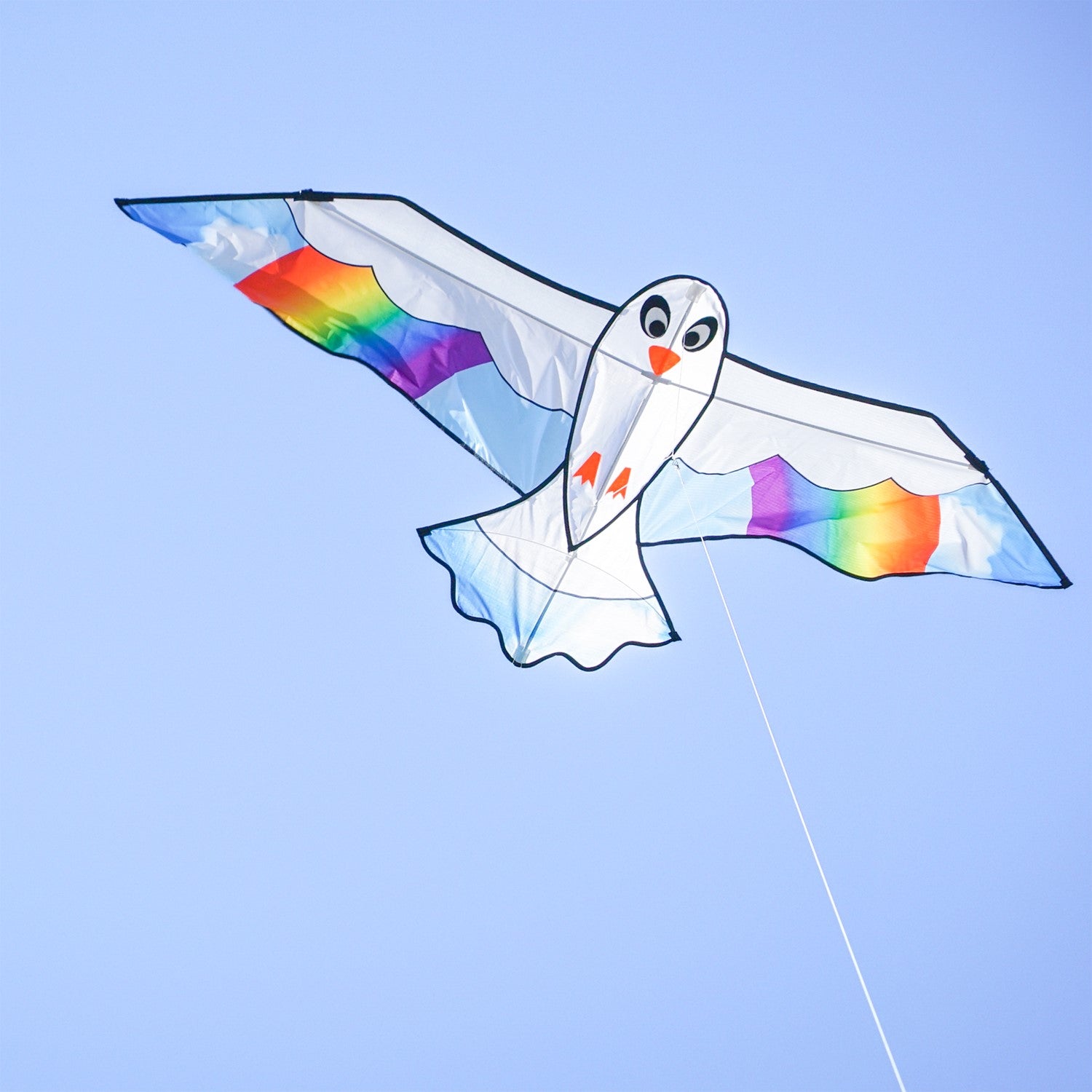 70-Inch Peace Seabird Kite soaring in the sky with a colorful design, showcasing a whimsical seabird and felt details.