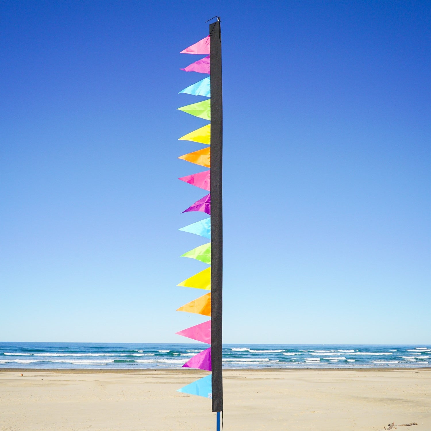 8-foot Fiesta Pennant Banner with 15 colorful triangle pennants hanging in a festive outdoor setting, perfect for celebrations.