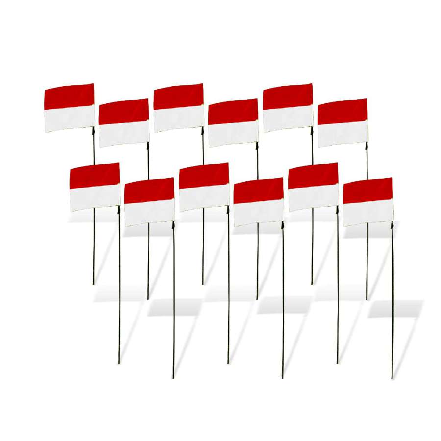 Set of 12 8 in. FPV Racing Flag Markers with red and white colors displayed on fiberglass poles, enhancing visibility during an FPV racing event.