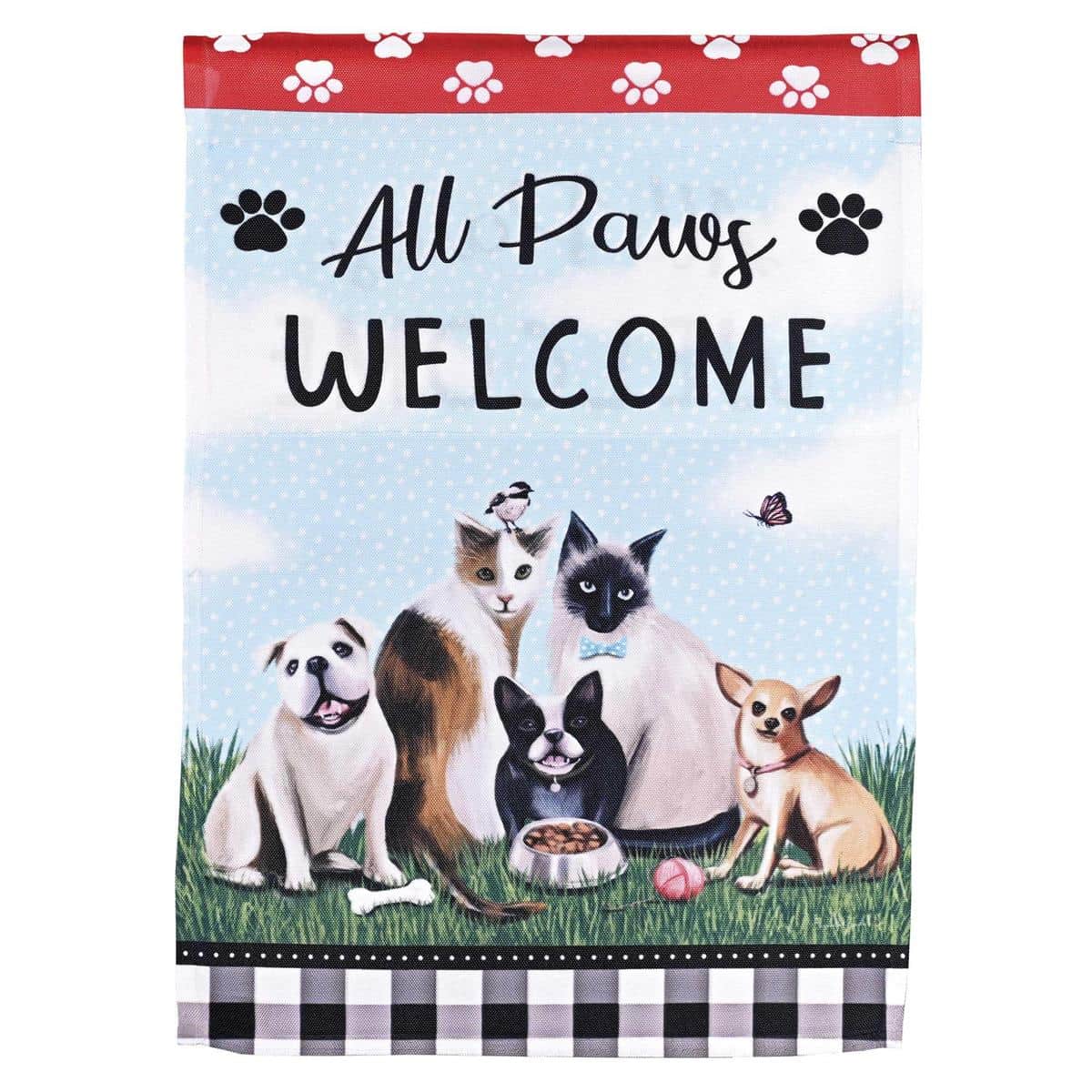 All Paws Welcome 13x18 garden flag showing colorful paw prints and playful pet silhouettes around a warm welcome message, displayed on a yard flag pole by a porch with greenery