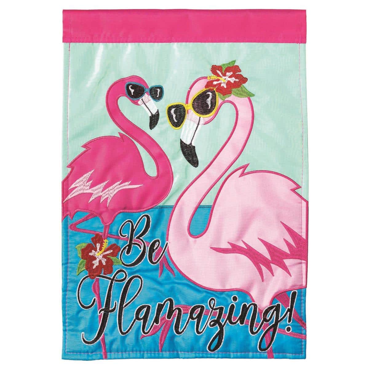 Close-up photo of the Be Flamazing 13x18 flamingo garden flag showing double applique layers, bright pink flamingo artwork, textured stitching detail, and the reinforced sleeve ready to hang on a standard garden pole.