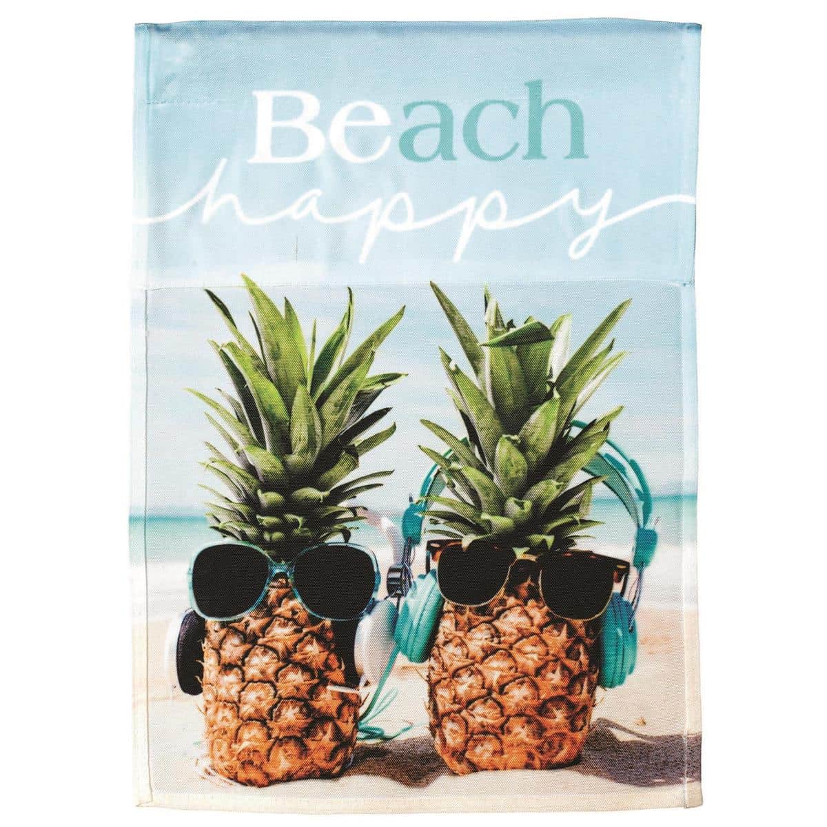 Beach Happy Pineapples 13x18 garden flag with bright printed pineapples, beach icons and bold summer colors shown on a small garden pole by a front porch step