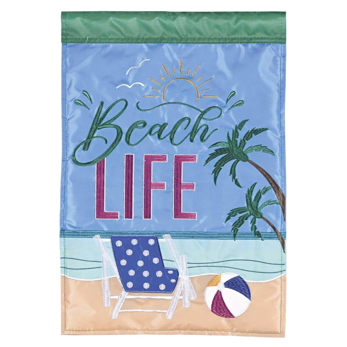 Close-up of Beach Life Palm Tree 13x18 double applique garden flag showing layered palms, aqua water, sandy shore, and a top sleeve on a standard stand.