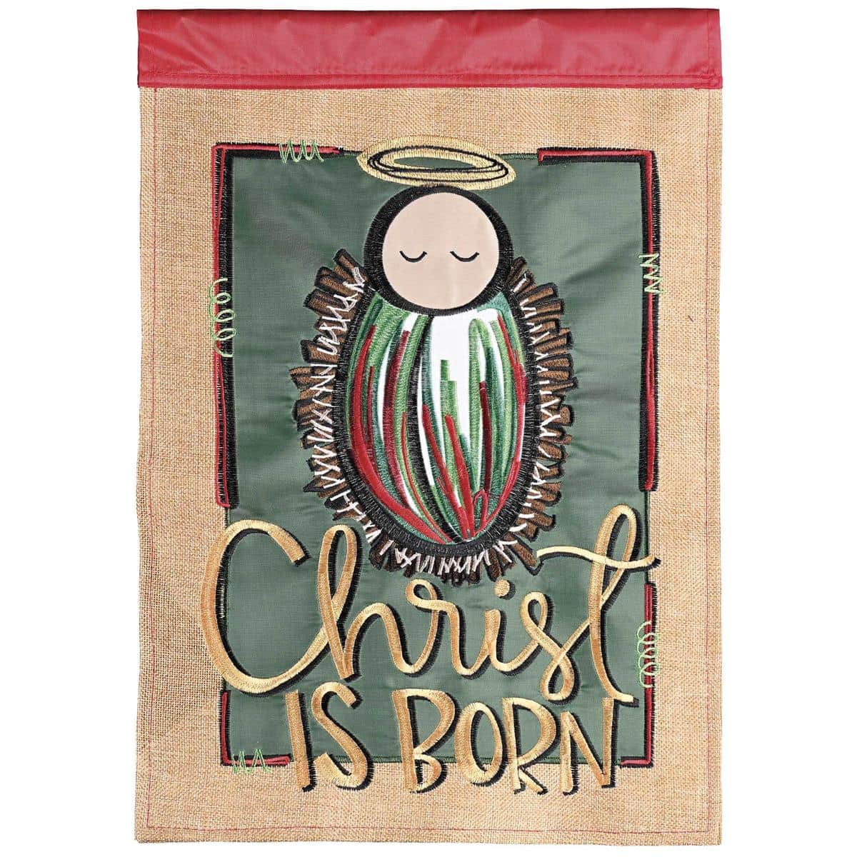 Alt text for main product image: 13x18 Christ Is Born garden flag double applique nativity scene Christmas outdoor decoration shown on a metal garden stake in a winter porch setting.