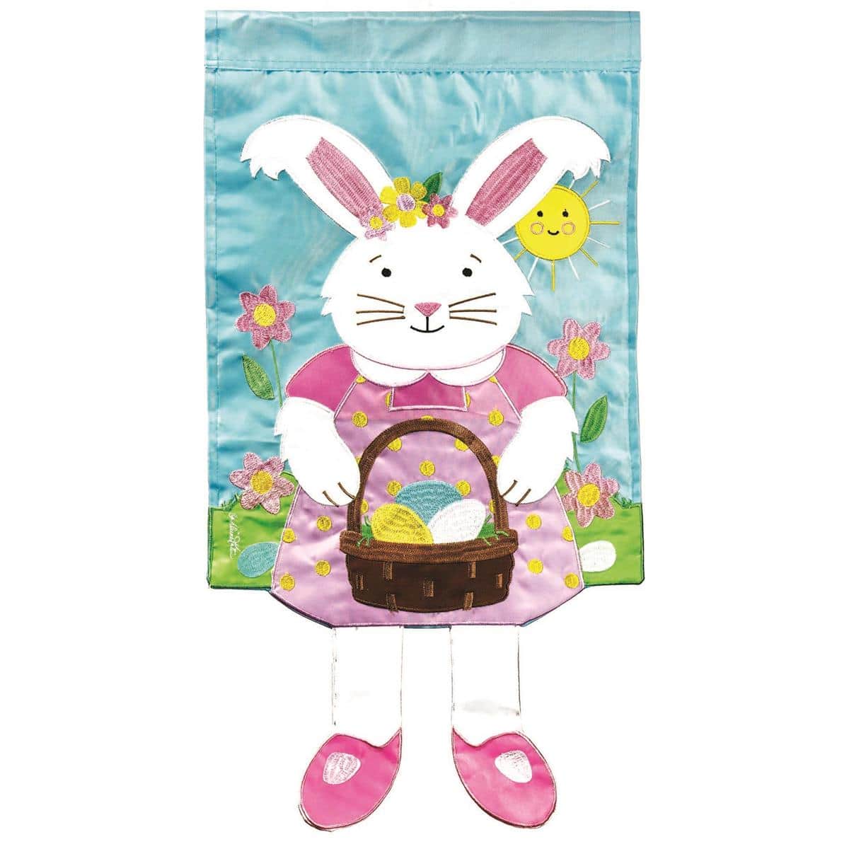 Crazy Leg Girl Bunny garden flag 13x18 displayed on a metal garden flag stand in a spring garden setting, showing a playful bunny with striped crazy legs and bright seasonal colors.