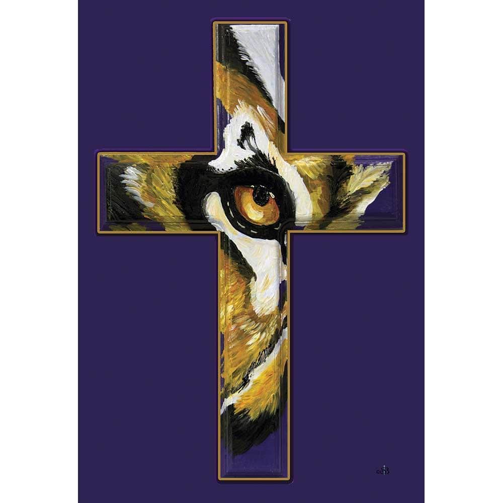 Eye Of The Tiger Cross 30x44 printed banner flag with vivid tiger eye graphic over a bold cross, high-contrast orange and black design on durable outdoor fabric, shown hanging on a pole.