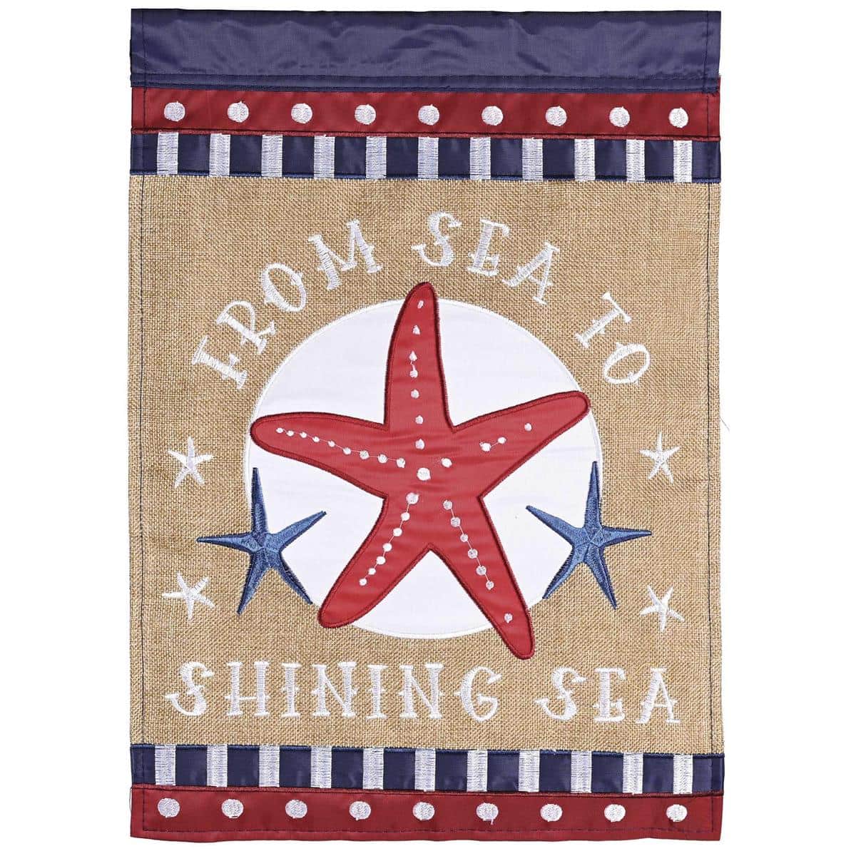 13x18 From Sea To Shinning Sea double applique garden flag with patriotic stars, stripes, and coastal motifs displayed on a yard stand for small space outdoor decoration