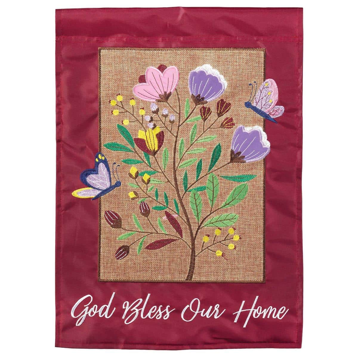God Bless Our Home InspireFlowr 13x18 double applique garden flag with layered floral appliques and stitched blessing, displayed on a stand by a front walkway.