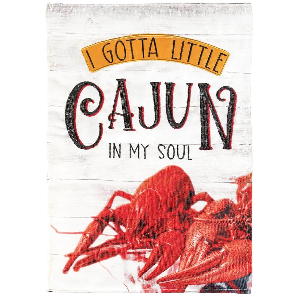 Gotta Little Cajun In My Soul 29x42 banner flag with Louisiana animal motifs and bold lettering, double-applique texture shown on a porch flagpole in outdoor setting.