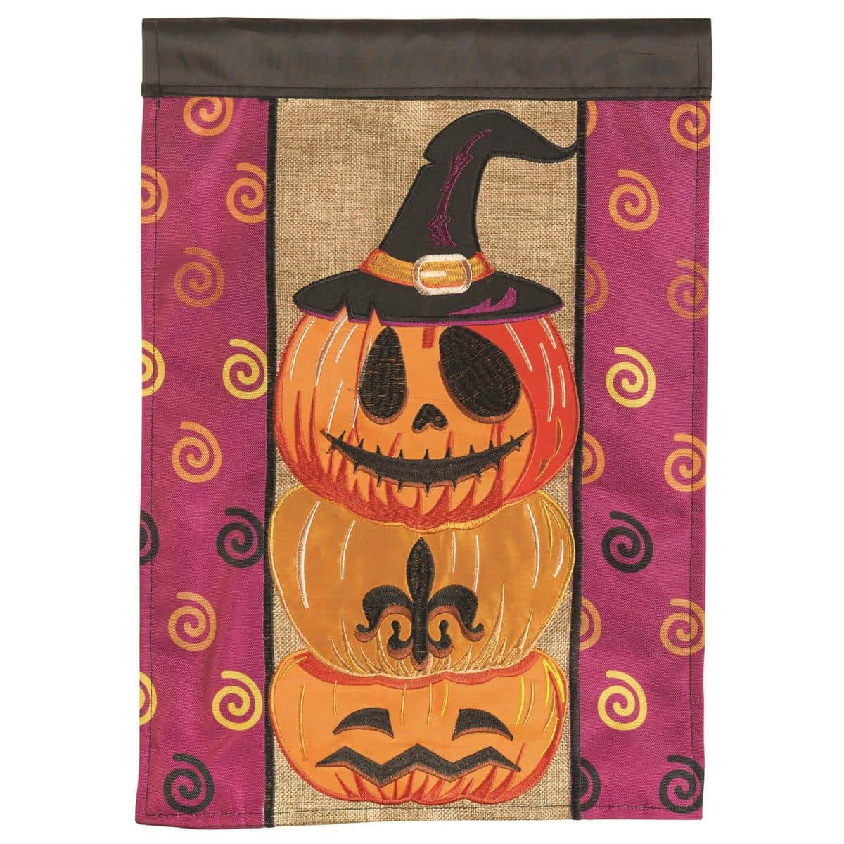 13x18 garden flag with an orange jack-o-lantern face, gold fleur-de-lis applique and layered fabric textures on a dark background, shown mounted on a small garden flag stand for porch display.