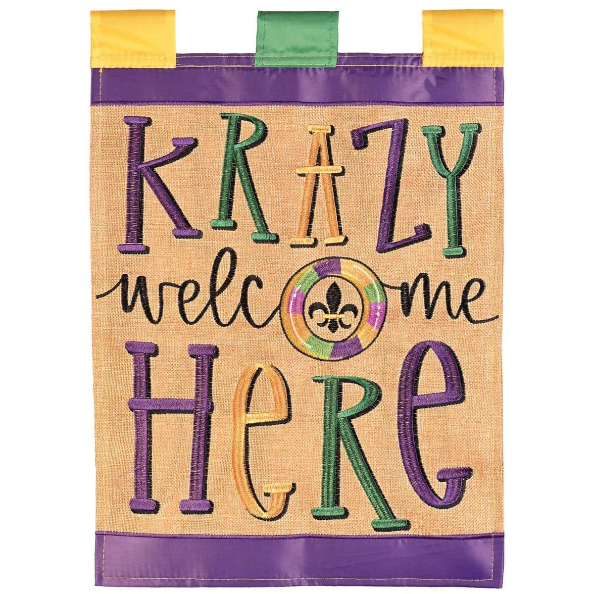 Krazy Welcome Here 13x18 double applique Mardi Gras garden flag with purple green gold palette, beads, masks, and fleur-de-lis greeting for outdoor display.