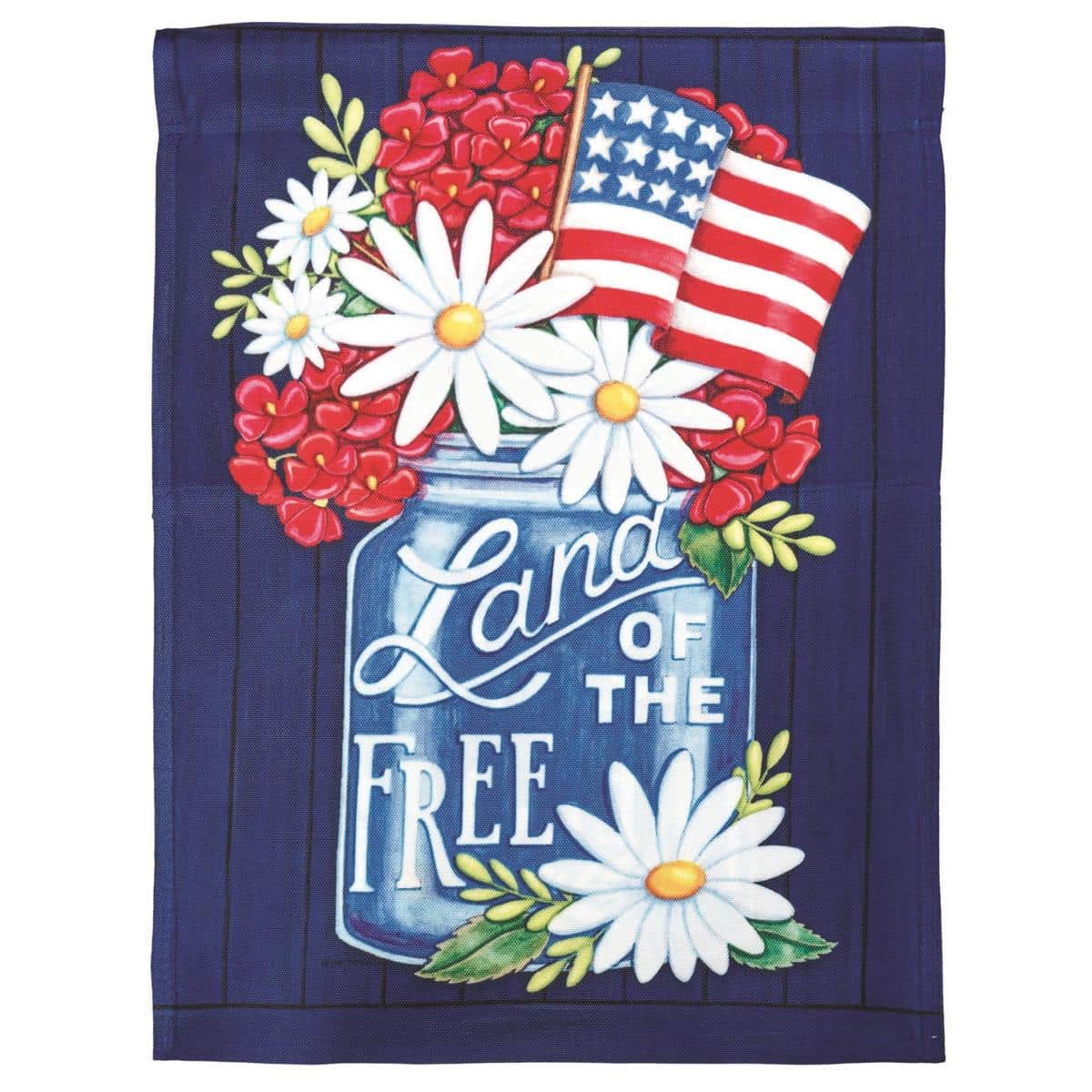 Close-up photo of the Land Of The Free 13x18 printed garden flag installed on a standard garden flag stand, showing bold lettering and stars-and-stripes inspired patriotic graphic on durable outdoor fabric.