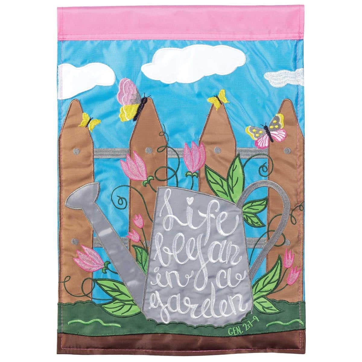 13x18 "Life Began In A Garden" double applique garden flag with layered floral appliques and script lettering displayed on a garden flag stand.