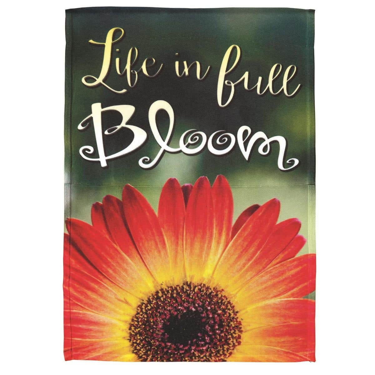 Main image of Life In Full Bloom 13x18 printed garden flag showing colorful botanical blooms and green foliage on a flag stand beside a brick porch and potted plants.