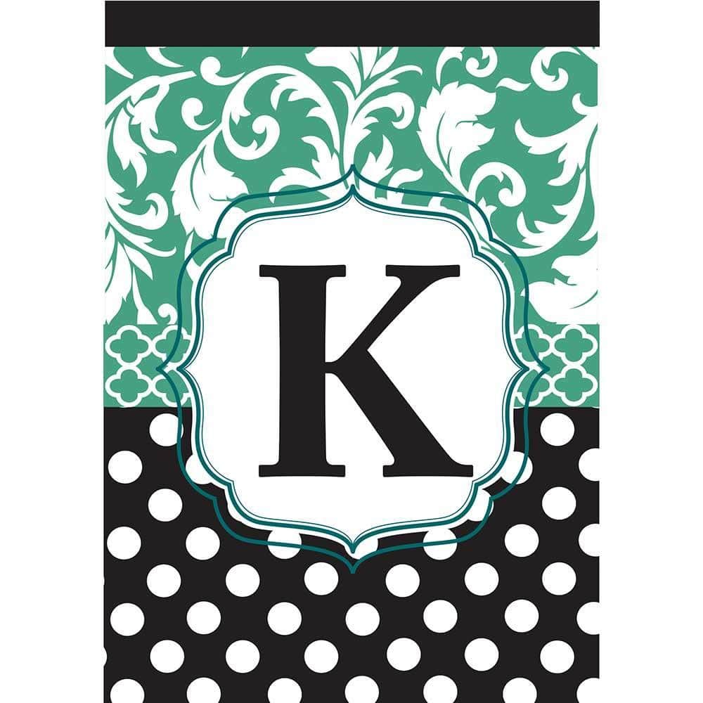 13x18 Monogram K garden flag in black and aqua double applique textile, displayed on a metal garden stand with close-up detail of layered appliques and stitched edges.