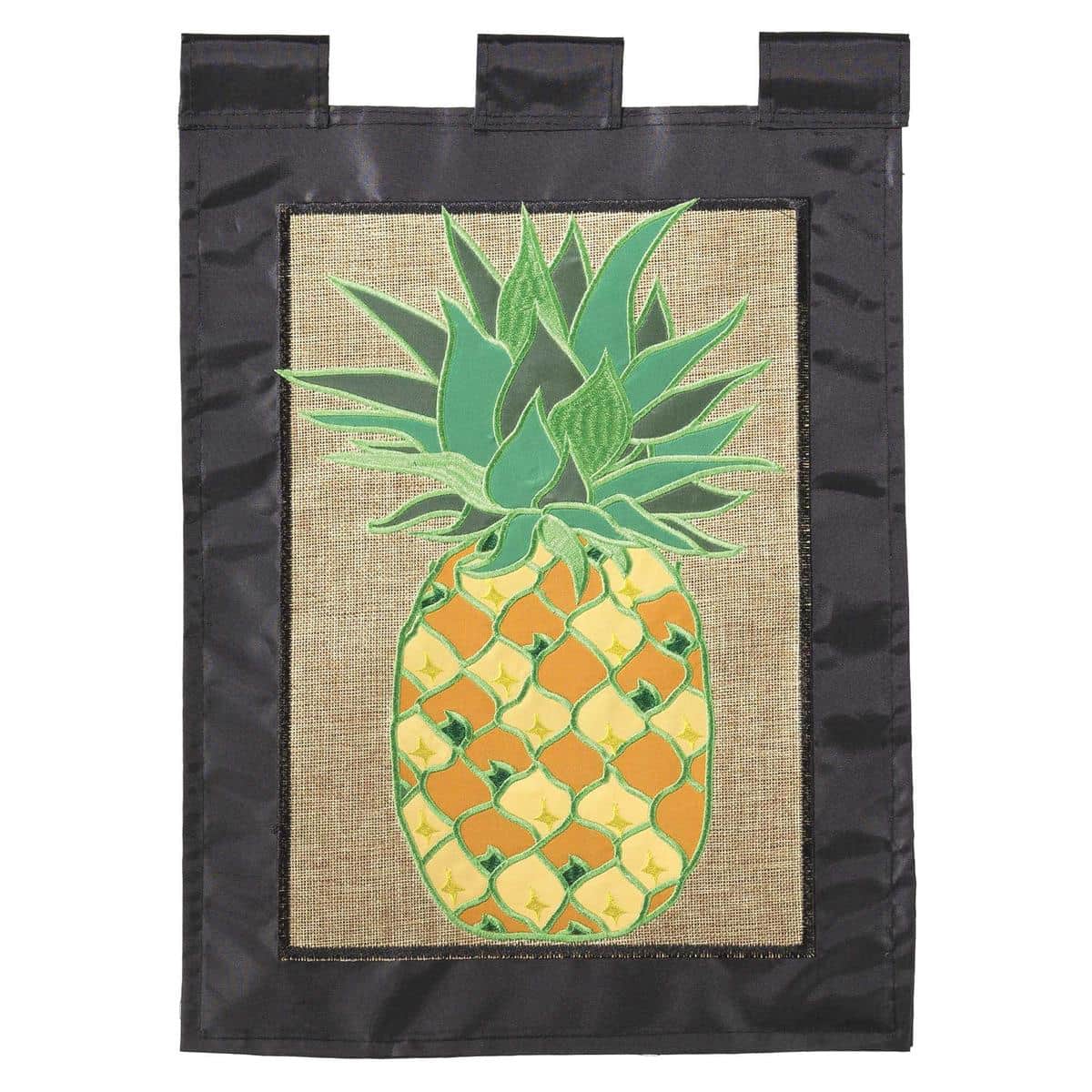 Pineapple burlap banner flag 29x42 inches photographed hanging from a porch pole showing applique pineapple motif, textured natural burlap background, and reinforced stitched hem for outdoor display.