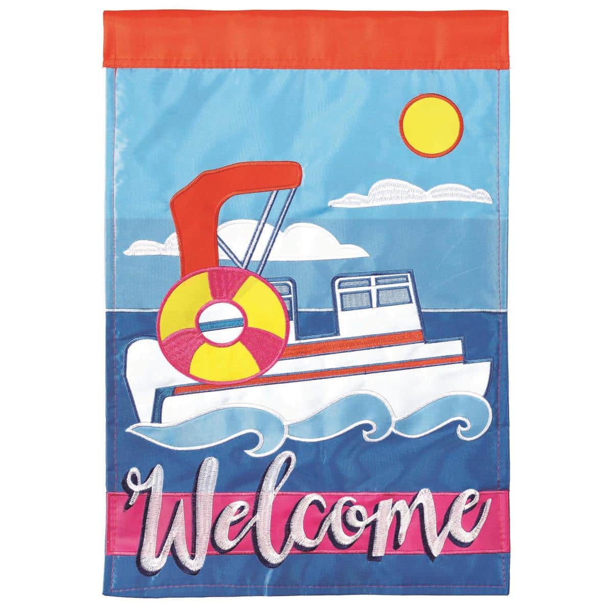 Double applique 13 x 18 garden flag showing a pontoon boat with Welcome text in a lakefront scene, displayed on a stand by a dockside garden path