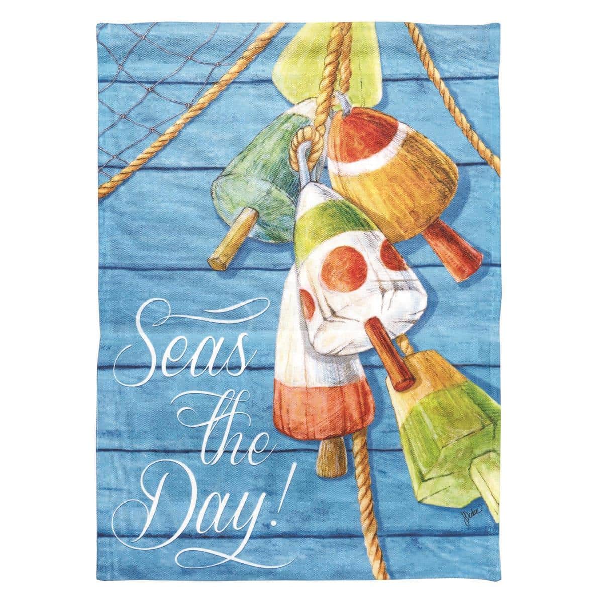 Seas The Day banner flag hanging on a front porch with navy and sand tones, showing playful 'Seas The Day' text and coastal wave and shell motifs in a printed coastal design.