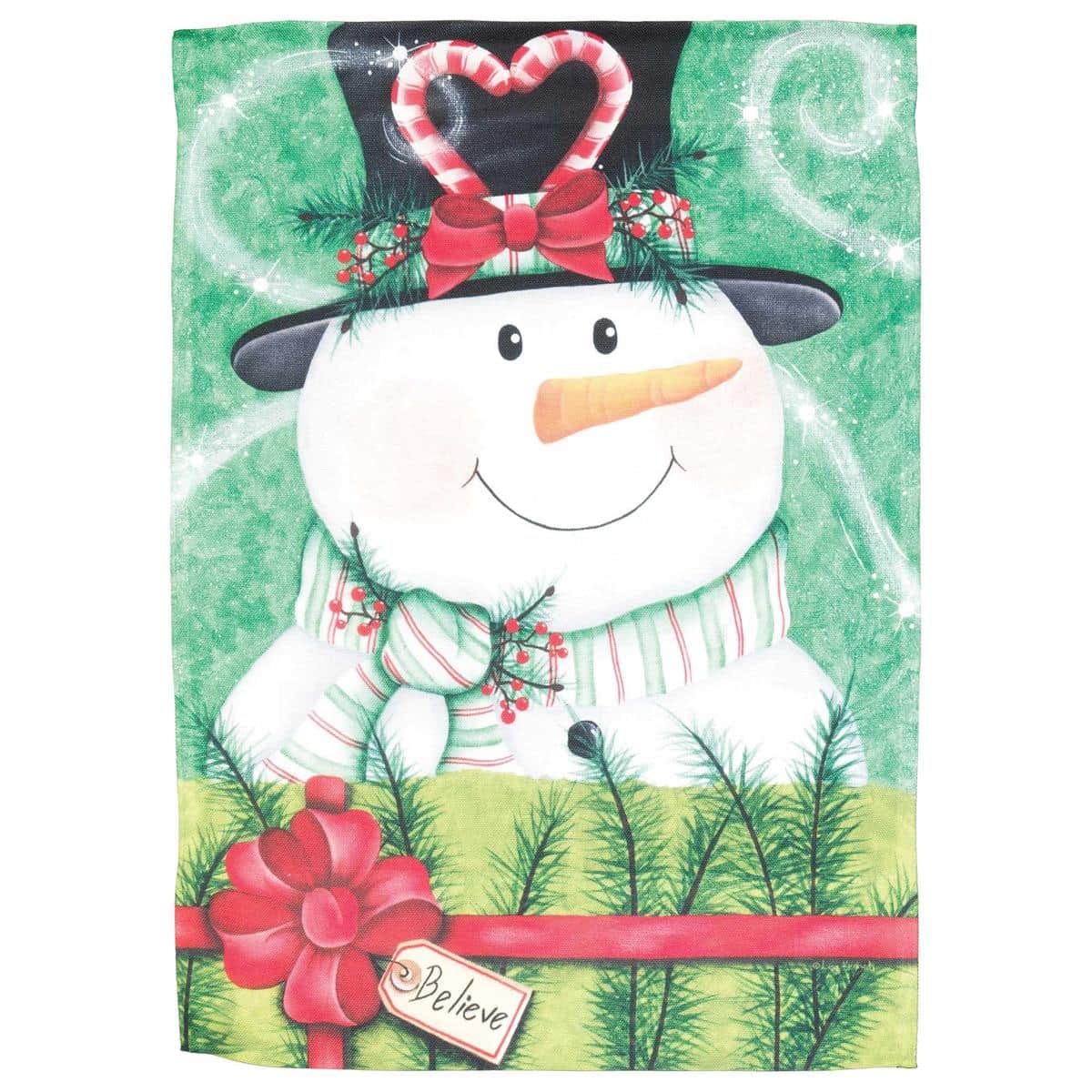 Close-up photo of the Snowman Believe printed banner flag 30x44 showing a smiling snowman wearing a scarf and hat with the word "Believe" in festive lettering on a colorful background, ideal for outdoor Christmas decoration.