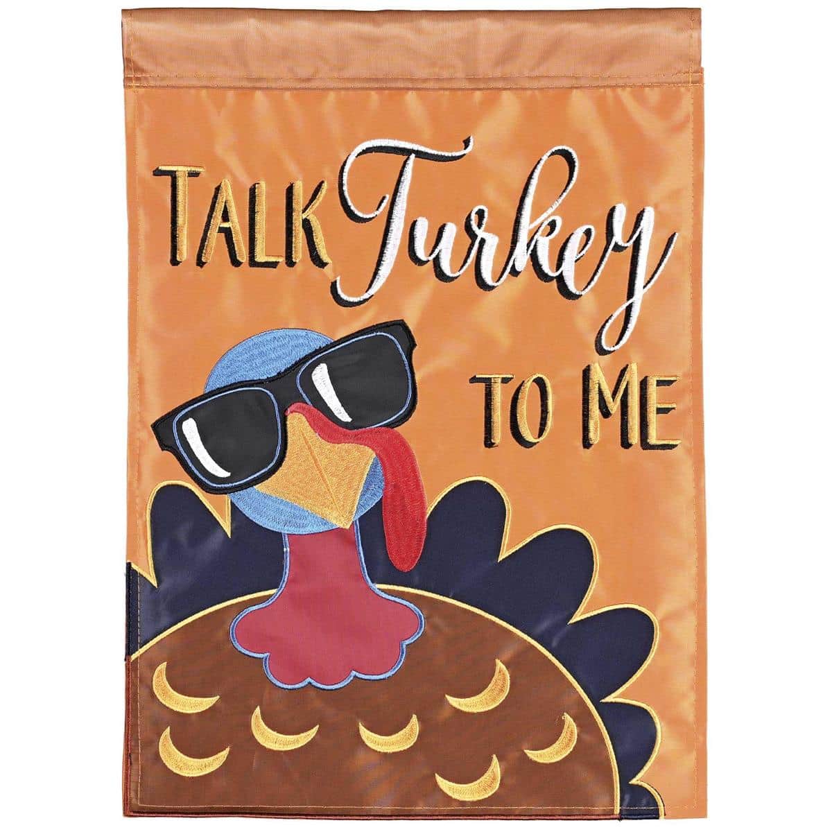 Seasonal Thanksgiving flag showing a whimsical turkey wearing sunglasses with the words "Talk Turkey To Me" in bright fall colors on layered double applique fabric.