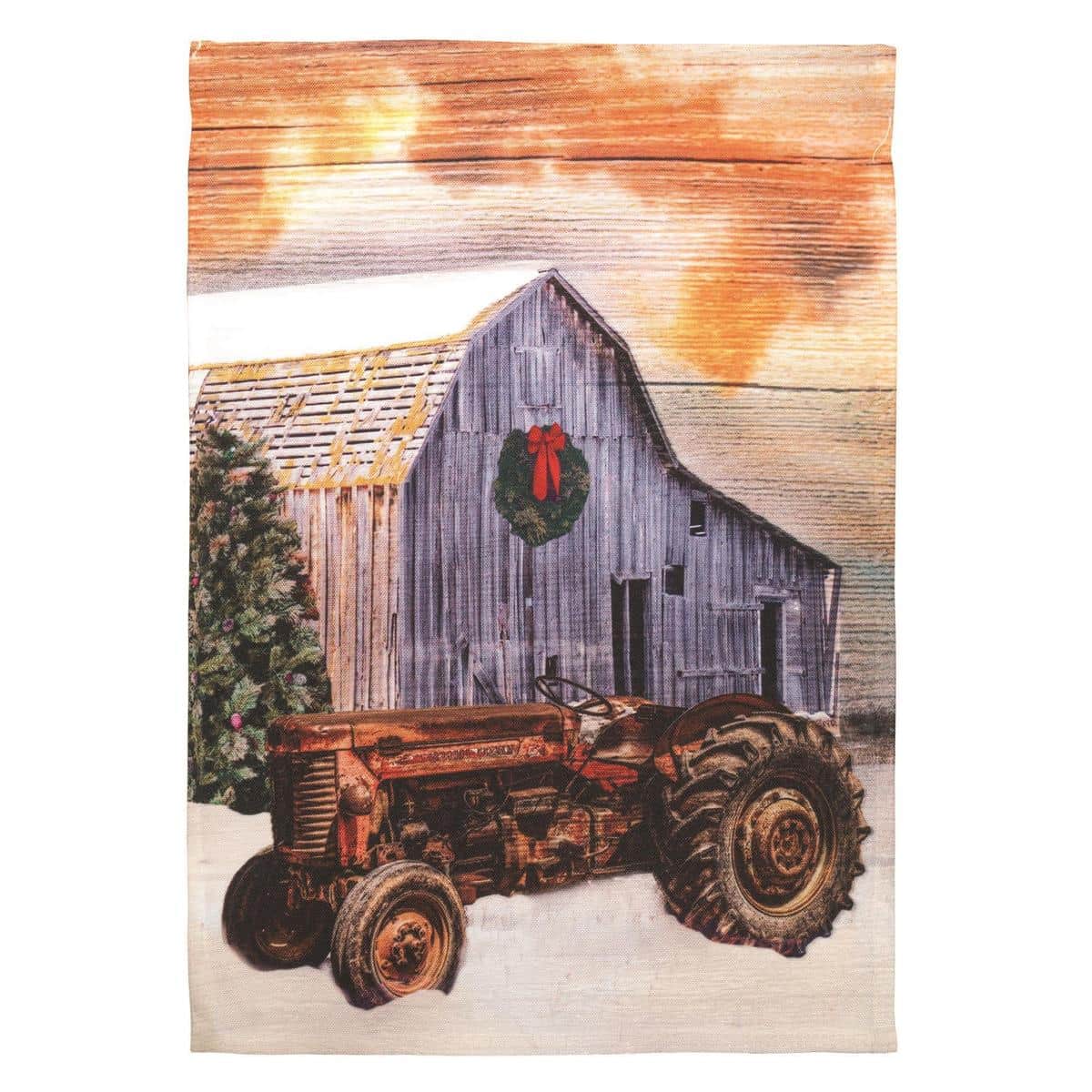 Close-up of Tractor In Snow printed 30x44 banner flag showing a vintage red tractor in a snowy field with pine trees and holiday lights, ideal for porch or garden display.