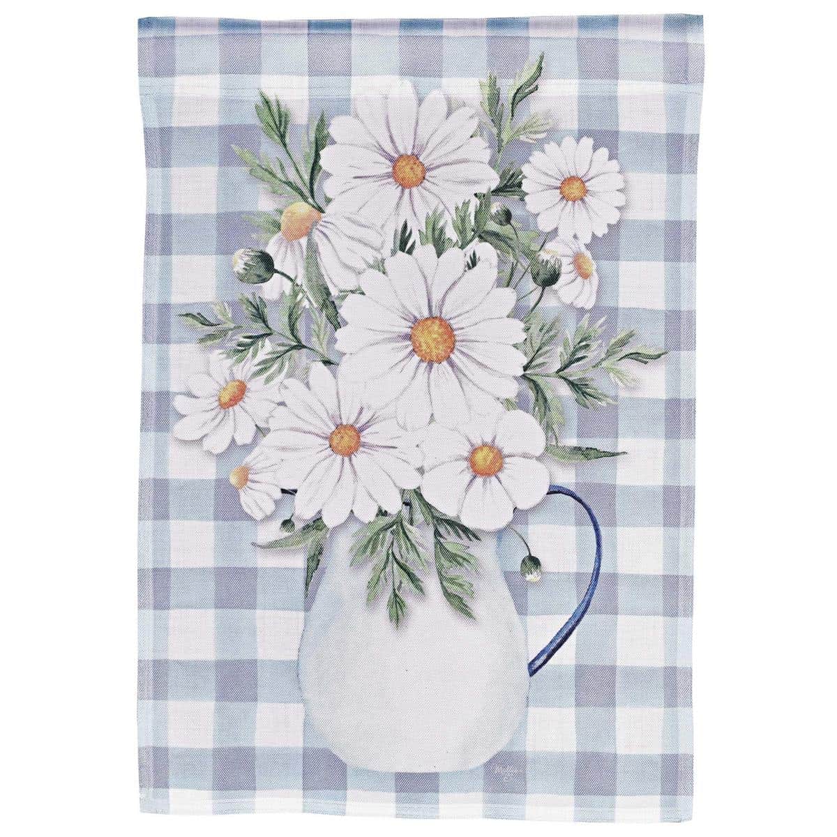 13x18 Welcome Daisies garden flag printed with yellow and white daisies framing bold Welcome lettering, shown on a black metal garden flag stand beside a front walkway.