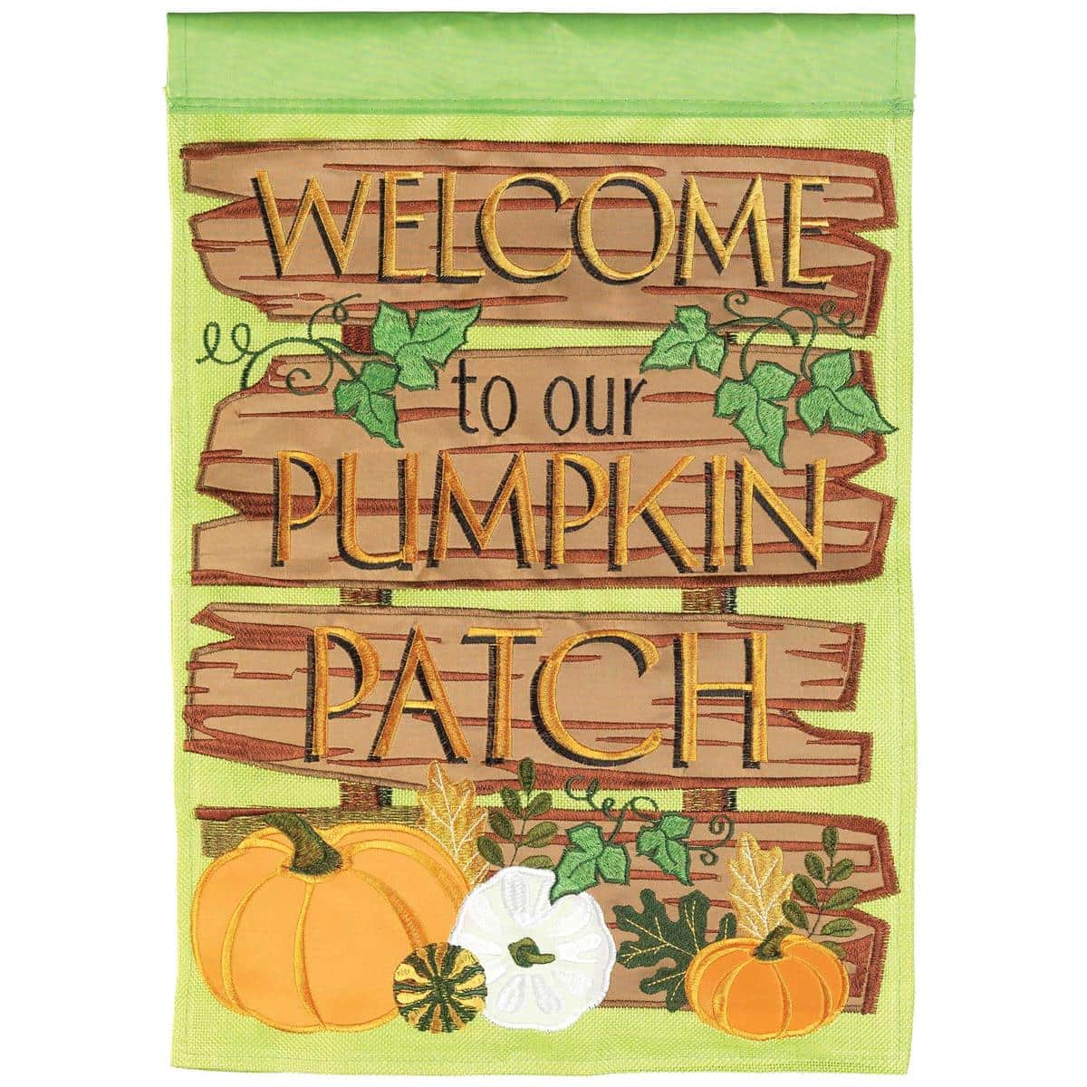 Closeup of Welcome Pumpkin Patch burlap banner flag 29x42 with layered applique pumpkins, autumn leaves and Welcome text on a rustic burlap background.