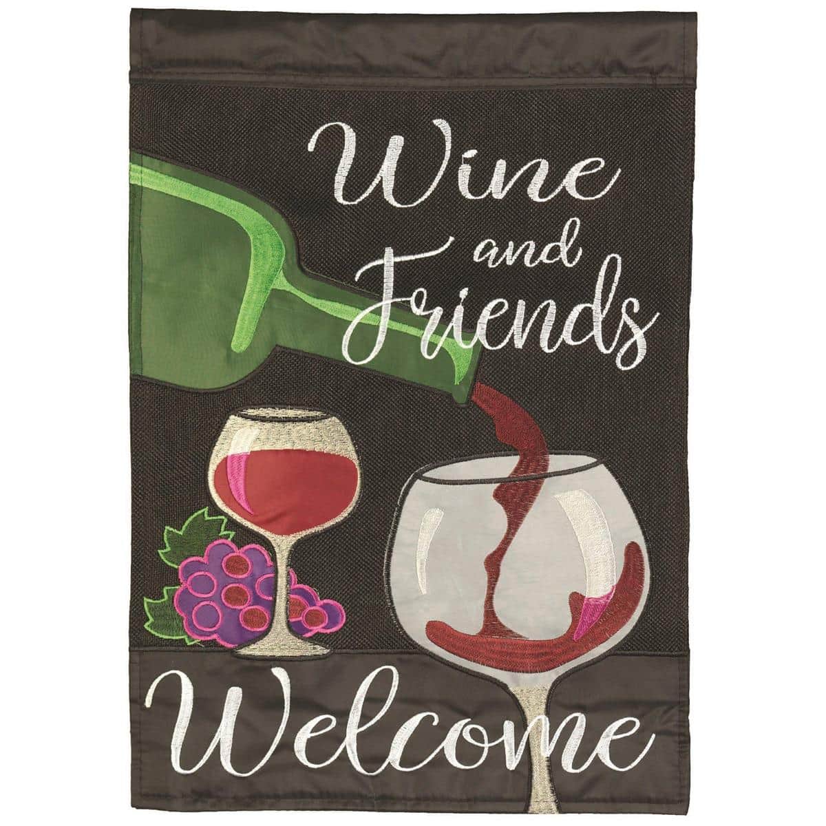 13x18 garden flag reading "Wine And Friends Welcome" with applique wine glasses and script lettering displayed on a metal garden flag stake near potted plants.