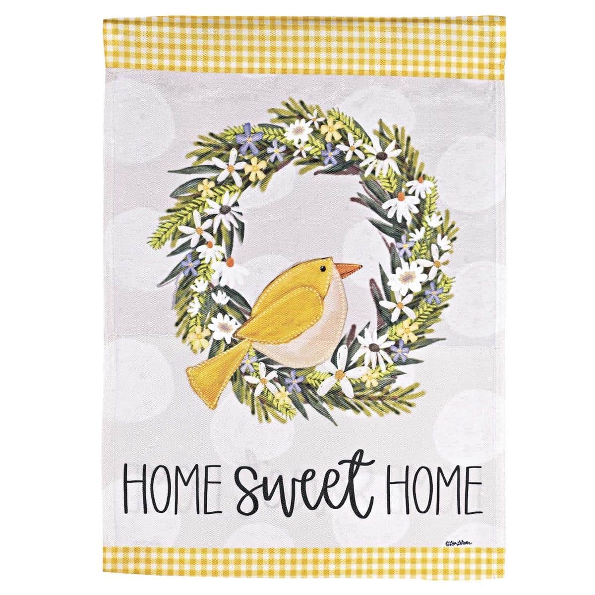 Yellow bird perched beside Welcome text on a 13x18 printed garden flag displayed on a black metal stand among green foliage and colorful potted flowers